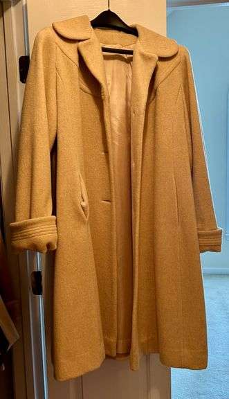 Women’s Coat (Located in Hallway Closet)