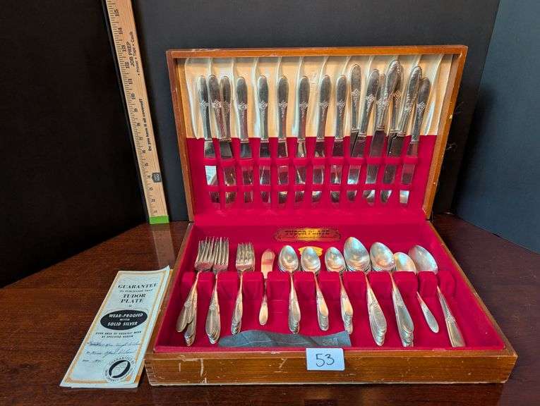 74 pc. Tutor Plate Oneida Community flatware with case(located in dining room)