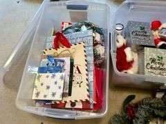 2pc Containers of Christmas Items (Located in Bedroom to the Right)