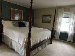 King size 4 post bed, bedding/electric mattress pad, pillows included, 81"x87"x top of post 87"tall 