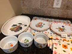 Floral and fruit dishes and placements (located in kitchen)