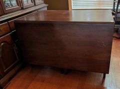 Drop leaf table, 73.5"x46"x30.5" tall, scratches on table (located in dining room)