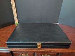 48 pc. W.M. Rogers & Son Flatware with case(located in ds back bedroom)