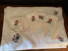 Napkins, place mats and napkin rings ( located in drawer in china cabinet)