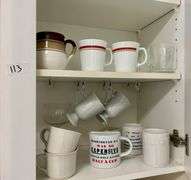 2 Shelf Lot of Cups (Located in Kitchen)