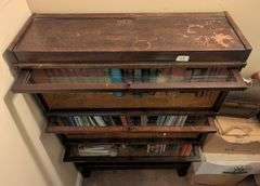 Vintage 3 Shelf  lawyer book case 34"x11.5"x52" tall, some damage on top, contents not included(stai