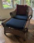 Wicker armchair,32" tall, 29" wide with matching ottoman, 30"x19"x19"(sunroom)