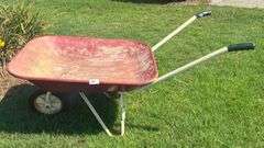 Red and White Wheel Barrow (Located Garage)