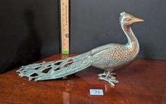 Metal peacock (located in ds back bedroom)
