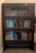 Vintage 3 Shelf  lawyer book case 34"x11.5"x52" tall, some damage on top, contents not included(stai
