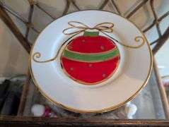 Basket of Pier 1 holiday plate and twisted peppermint lotion, shower gel, fragrance and more(ds back