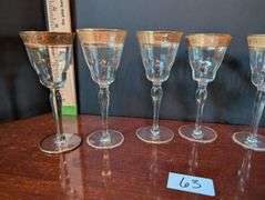 6 pc. Vintage gold rimmed wine glasses(located in dining room)