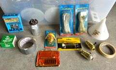 Plastic tote of Hardware and More (Located Garage)