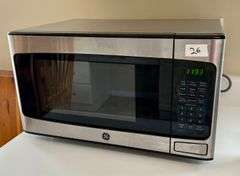 GE Microwave 11 3/4”x20 1/8”14 1/4” (Located in Kitchen)