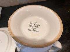 White plate, serving dish, and pitcher