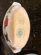 4 pc ”Fresh N’ Fruity” baking dishes and 10” Pier 1 Imports cake stands (located in kitchen)