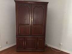 TV armoire, 48"x27.5"x82" tall (located in light blue bedroom)