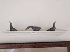 4pc. Decorative shelf, 24"x4"tall with 3 signed green stone carving of seals, tallest seal 3.5"tall(