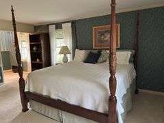 King size 4 post bed, bedding/electric mattress pad, pillows included, 81"x87"x top of post 87"tall 