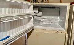 GE Refrigerator (Located in Basement)