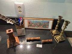 Miscellaneous lot: candle holder, ice pick, pottery jar of pens and tile giraffes (kitchen)