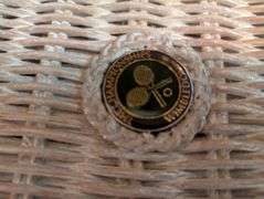 The Championship Wimbledon wicker table  26"x26"x24"tall(located in living room) matching lots 13,24