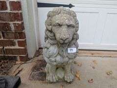 Lion statue, 10"x19"x22" tall, damage on leg(located outside garage)