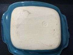 Palms up pottery dish, large ramekin, pair of square trays (located in kitchen)