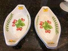 4 pc ”Fresh N’ Fruity” baking dishes and 10” Pier 1 Imports cake stands (located in kitchen)