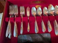 74 pc. Tutor Plate Oneida Community flatware with case(located in dining room)