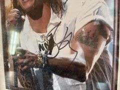 Framed and Autographed Steven Tyler Photo (Not Authenticated, 12 x 15 in, Located in ds back room)