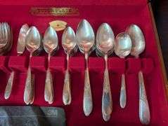 74 pc. Tutor Plate Oneida Community flatware with case(located in dining room)