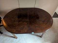Oval table, 55"x40"x29"tall, (2) leaves 12” (located in upstairs bedroom)