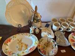 17 pc Easter lot, plates, platters, mugs, egg trays, etc. Stand not included (located in ds back roo