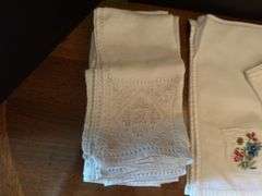 Napkins, place mats and napkin rings ( located in drawer in china cabinet)