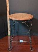 Twisted wrought iron stool wood top(located in DS back bedroom)
