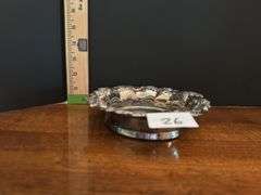 2pc Vintage silver plate wine coaster and marble wine cooler (located in dining room)