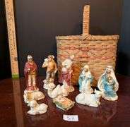 10 pc. figurines with basket (located in ds back bedroom)