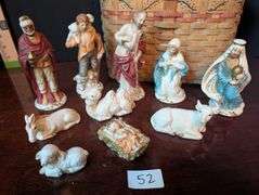 10 pc. figurines with basket (located in ds back bedroom)