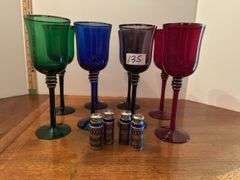 Set of 8 colored wine glasses and 2 salt and pepper sets (located in dining room)