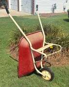 Red and White Wheel Barrow (Located Garage)