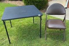 Black Folding Table, 33 5/8”X33 5/8”X27 7/8” (Some Wear) and Brown Folding Chair, 33 5/8” Tall (Smal