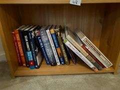2 Shelf Lot of Books and Crossword Puzzle Books (Located in Bedroom to the Right)