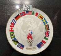 Assortment of 10 plates (located in kitchen)