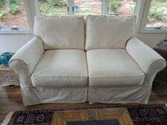 Couch, 63"x 41"x35"tall, some stains(located in sunroom)