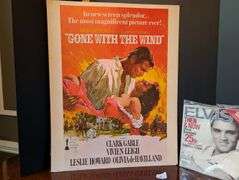 2 pc. Gone with the Wind Movie poster and Elvis magazine(located at front door)