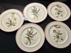 Assortment of 10 plates (located in kitchen)