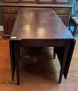 Drop leaf table, 73.5"x46"x30.5" tall, scratches on table (located in dining room)