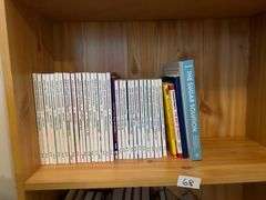 2 Shelf Lot of Books and Crossword Puzzle Books (Located in Bedroom to the Right)