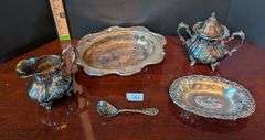 5 pc. Silver plated items, including Oxford silver Plated Co. Spoon(located in dining room)
